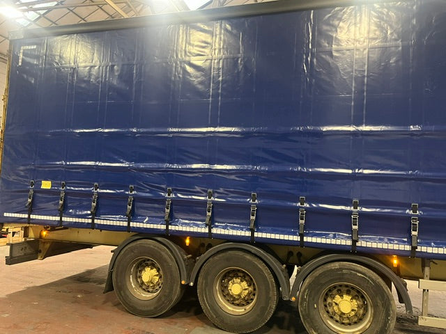 Navy blue curtainside trailer