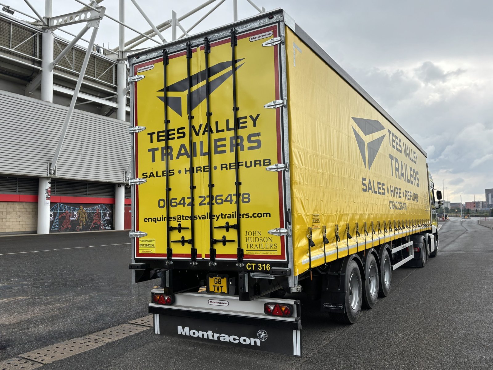 Tees Valley Trailers yellow curtain-side trailer at Riverside Stadium